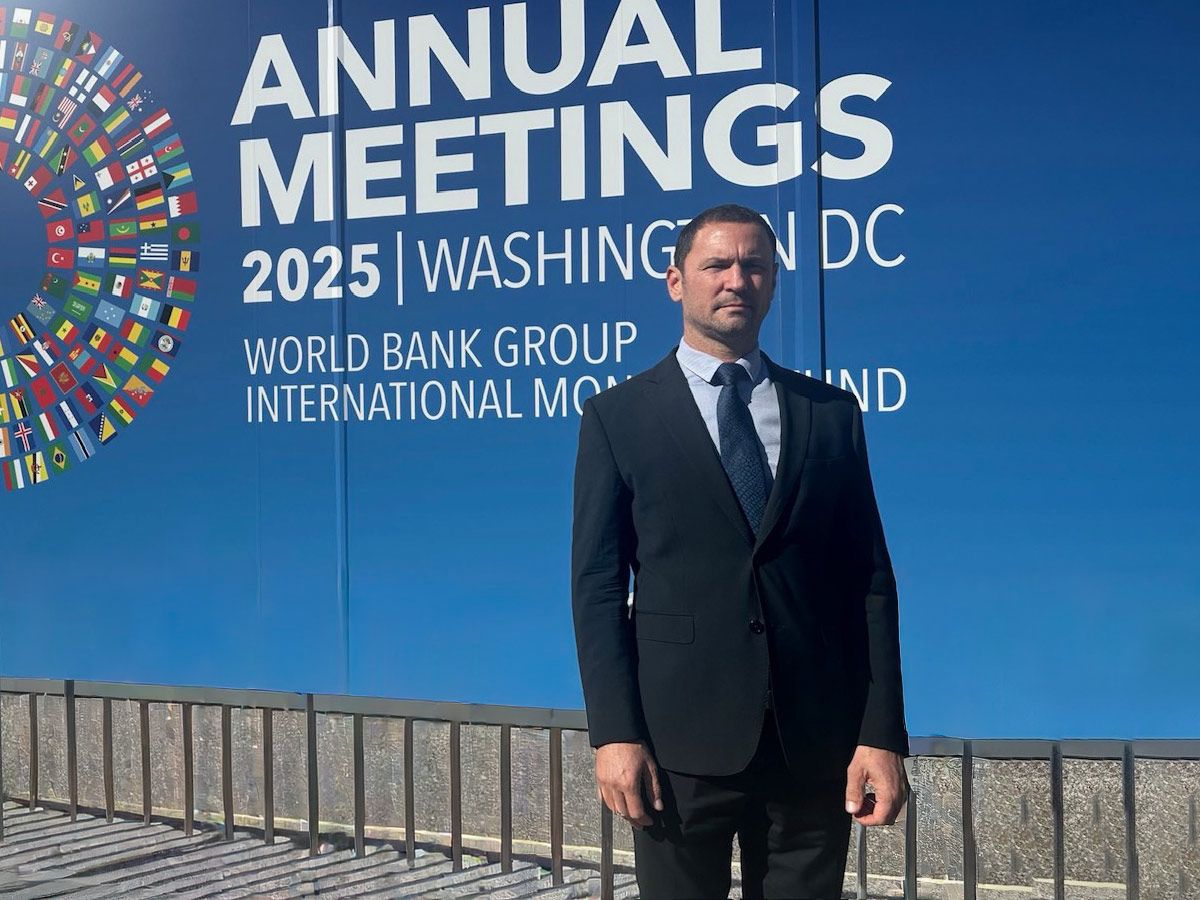 namestnik guvernerja Primož Dolenc pred panojem Annual meetings IMF