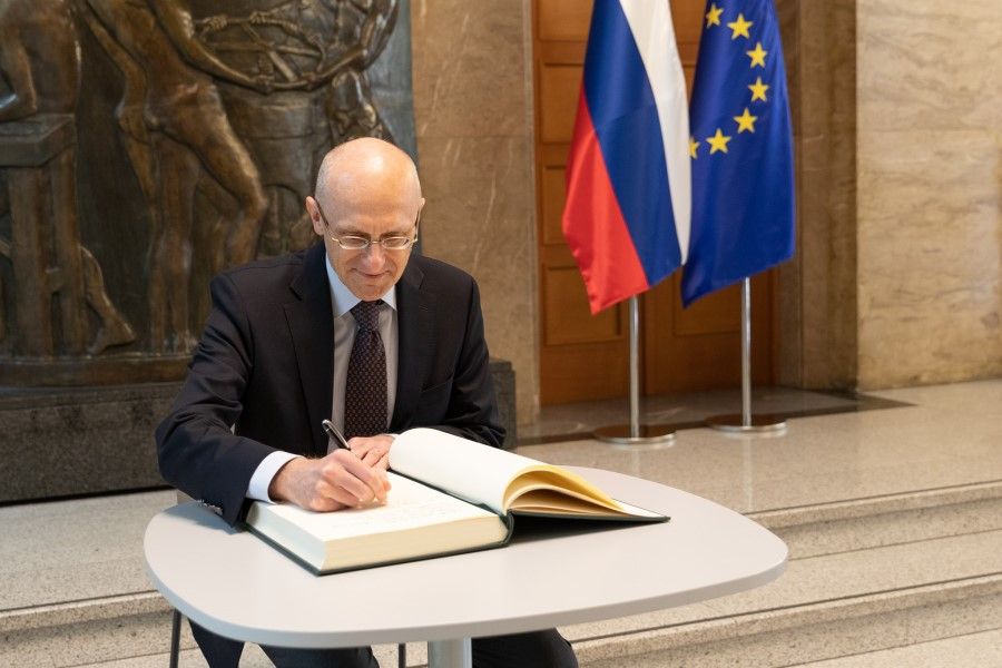 Signing the book of visits